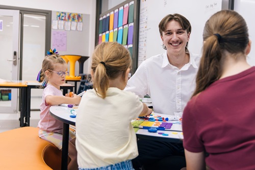Photo: Charles Fotinos in the classroom teaching students